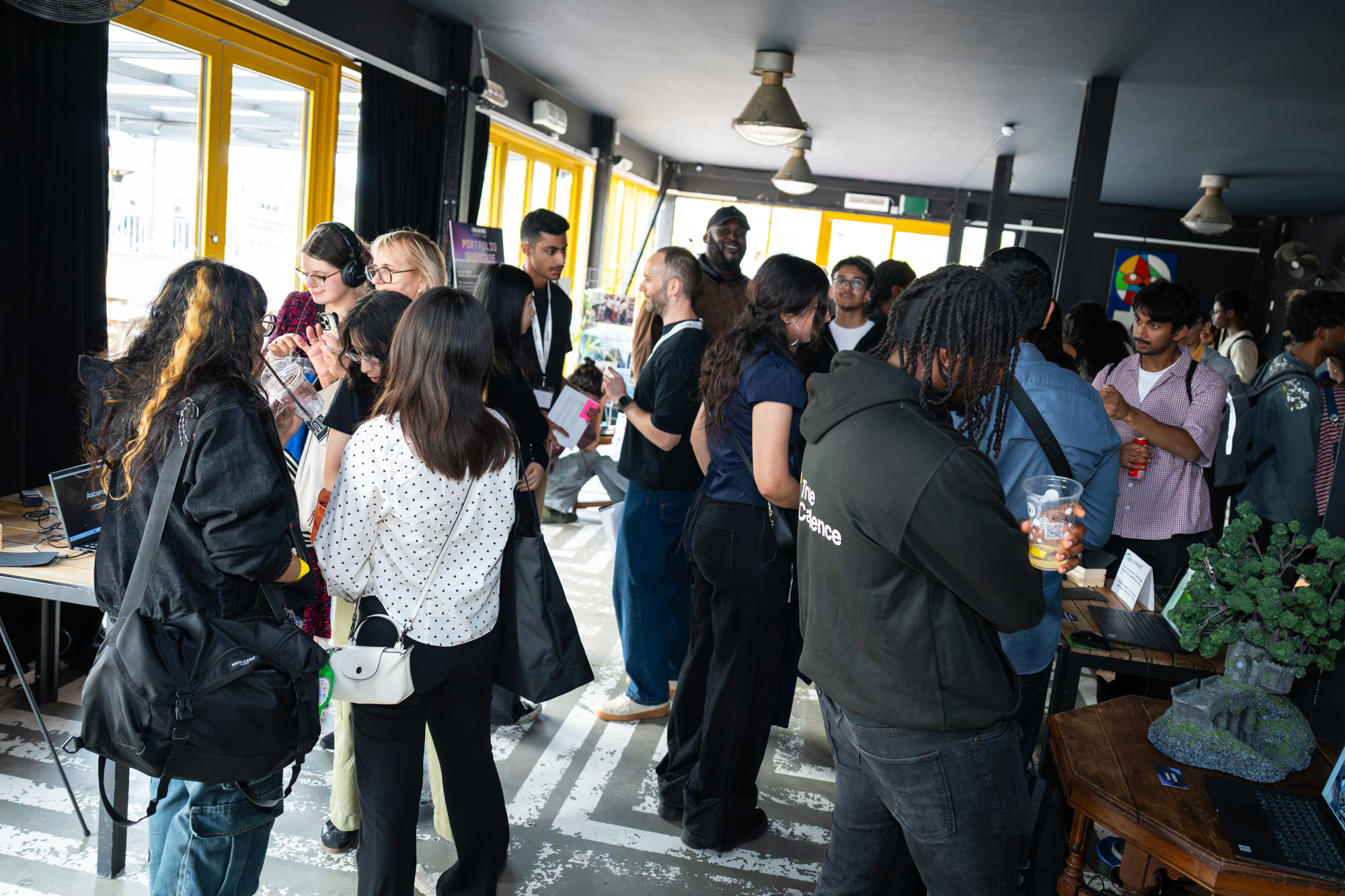 Group of people networking in a artistic showcase