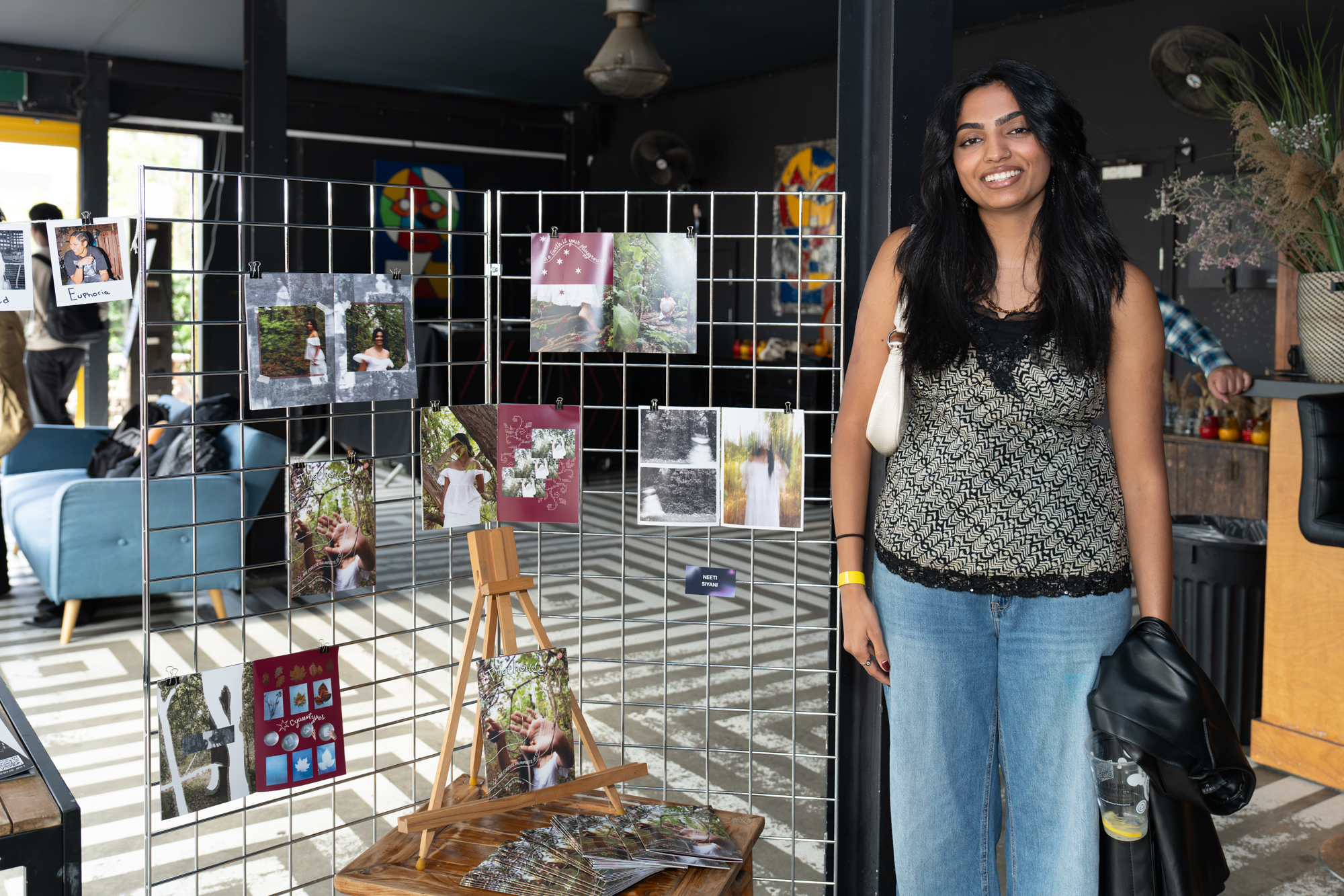 Person with their photographic art display