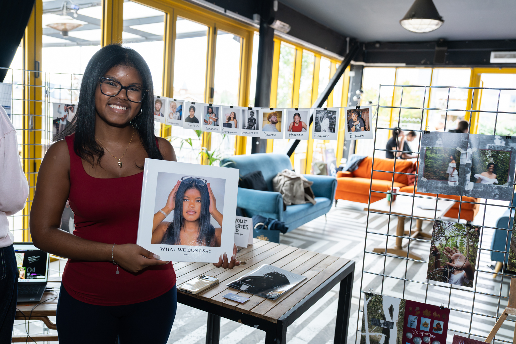 Person holding their photography portfolio